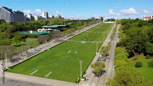 Aerial, tracking, drone shot, of empty Parque eduardo VII park in downtown Lisbon, sunny day, in Portugal - Coronavirus lockdown