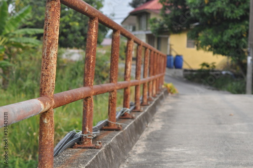 bridge way with a rusty holder