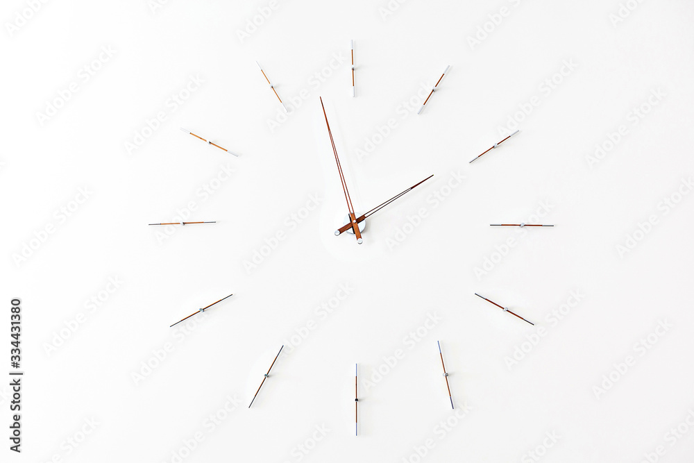 Clock on White Wall. Close up