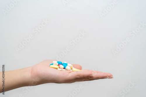 The drugs is placed on a woman's hand