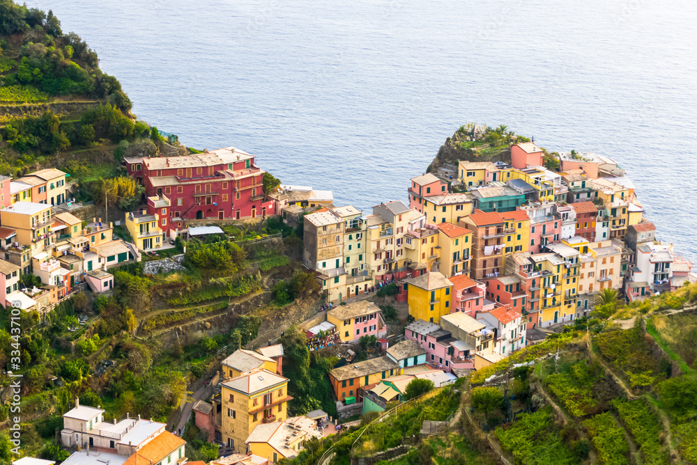 Detail of the curious little town of Manarola, one of the five lands in Liguria, Italy. A small pretty village full of colorfull houses