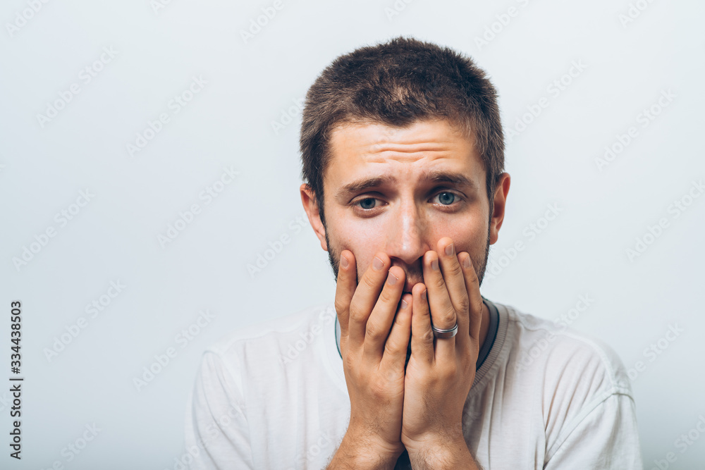 man closes a mouth hands man closes a mouth hands