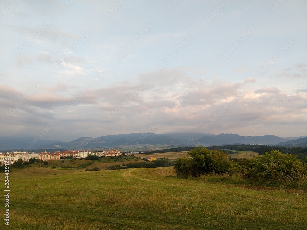 Sunrise or sunset over the hills and meadow. Slovakia