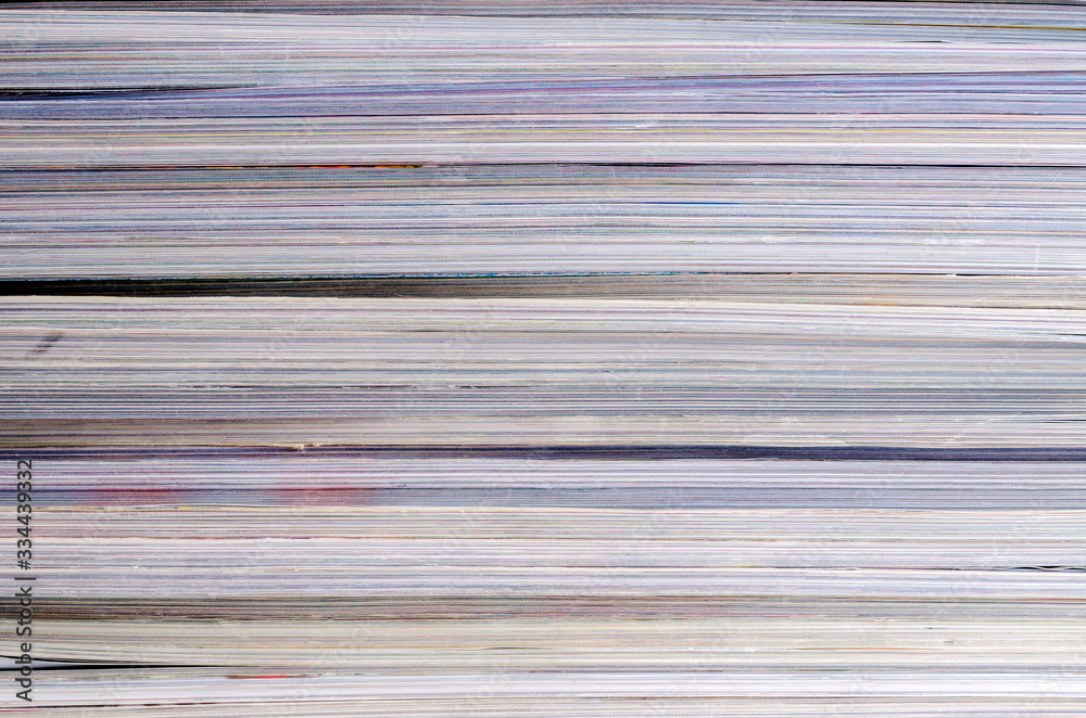 Closeup background of a pile of magazines. Closeup background of a pile of magazines.