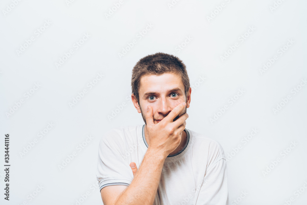 man laughs and covers her mouth man laughs and covers her mouth