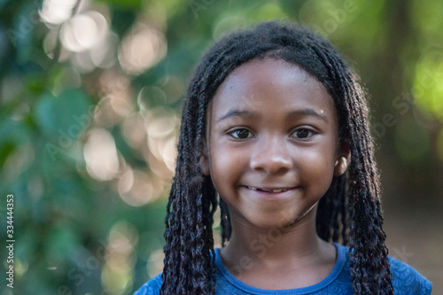 afro american girl looking at the camera with an peaceful expression