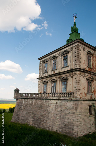 Pidhirtsi Castle is a residential castle located in the village of Pidhirtsi near Lviv, Western Ukraine.  Fragment of castle. Renaissance palace. Fortification of castle. Old architicture concepte.  photo