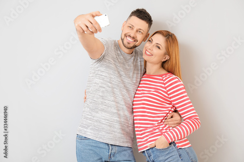 Happy young couple taking a...
