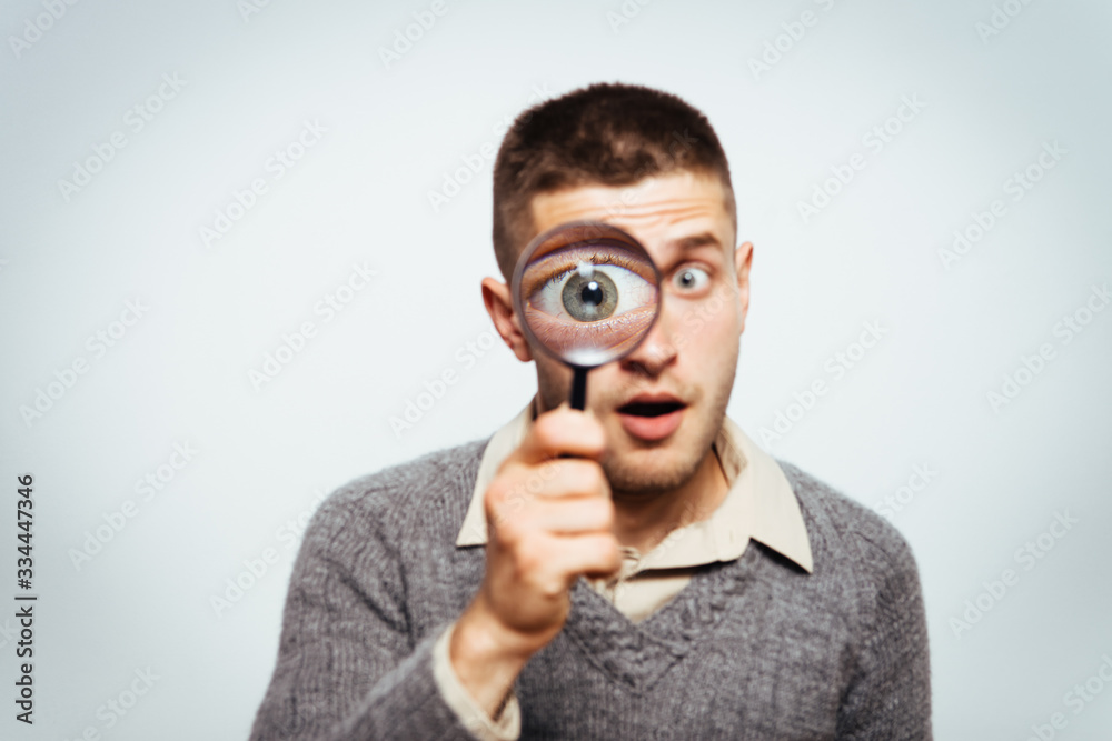 The man with a magnifier The man with a magnifier