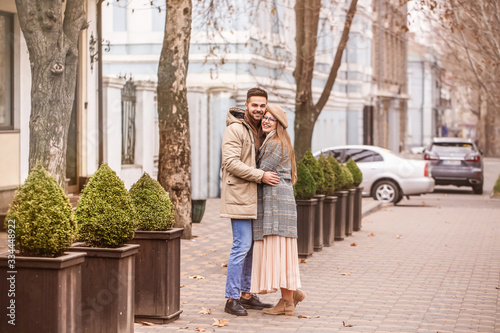 Portrait of happy young couple walking outdoors © Pixel-Shot