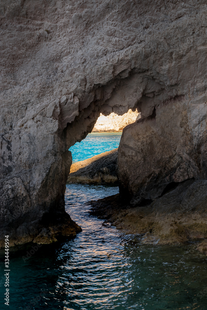 Close up of an incredible rock arch along the north western coastline near Shipwreck Beach, Zakynthos