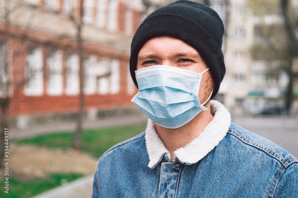 A man in a viral mask and in protective gloves, protection in prevention for coronavirus. A man in a viral mask and in protective gloves, protection in prevention for coronavirus.