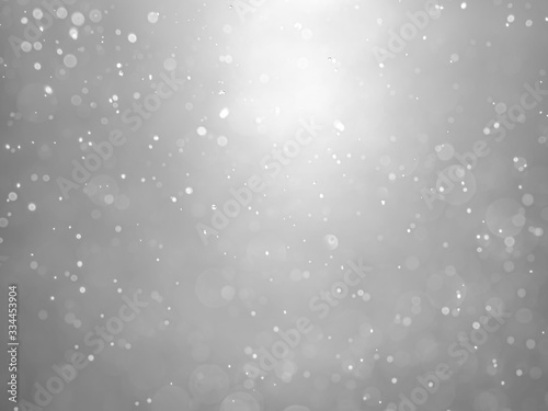 White and gray bokeh background.Abstract blur background. White bubbles on a black background.