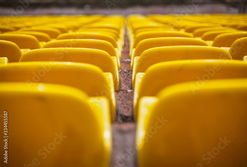 yellow tribunes close-up overlooking from top to bottom.