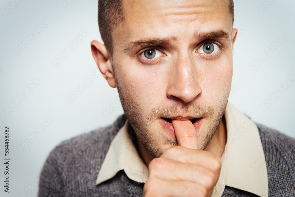 man bites his nails man bites his nails