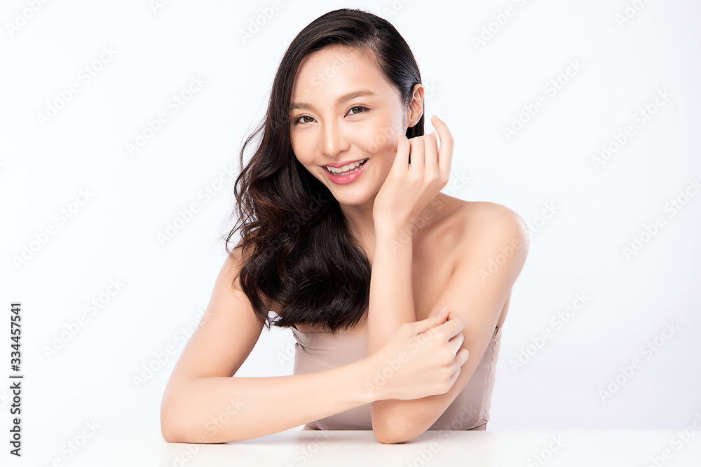 Beautiful Young Asian Woman with Clean Fresh Skin. Face care, Facial treatment, Cosmetology, beauty and healthy skin and cosmetic concept, woman beauty skin isolated on white background Beautiful Young Asian Woman with Clean Fresh Skin. Face care, Facial treatment, Cosmetology, beauty and healthy skin and cosmetic concept, woman beauty skin isolated on white background