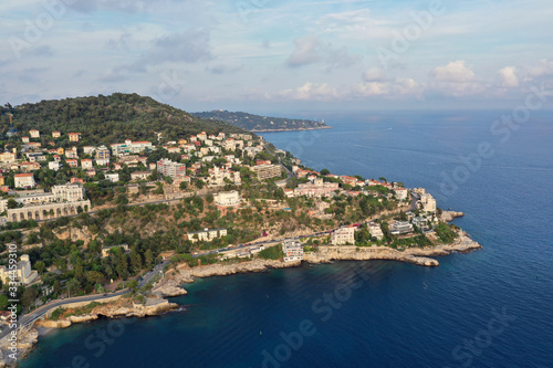 The coast of nice France, shooting from the air. Cote d'azur, the blue sea water. Rocky beach.