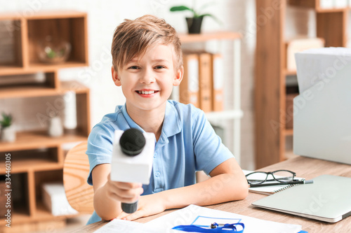 Little journalist with micr...