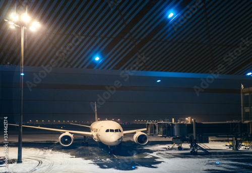 Plane at night airport.