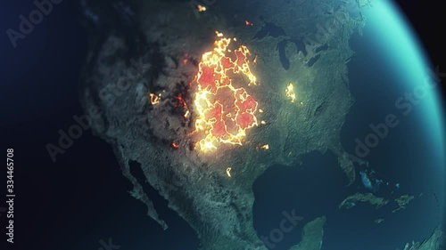 a shot from space for planet earth focusing on United States region and North America continent as we see a plague. infection or corona virus spreading across the land visualized in a fire effect