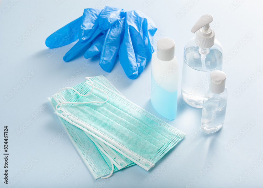 protective medical mask, gloves and sanitizer disinfecting gel. protective measures against virus, bacteria