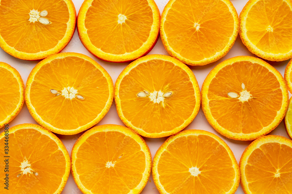 Juicy orange on a white background Orange fruit with orange slices and leaves isolated on a white background. Vitamin C. Orange closeup. Vegetarian, vegan food. Citrus fruits. Healthy skin nutrition Juicy orange on a white background Orange fruit with orange slices and leaves isolated on a white background. Vitamin C. Orange closeup. Vegetarian, vegan food. Citrus fruits. Healthy skin nutrition