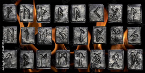 24 black pottery Norse runes isolated on fire background