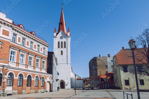 City Cesis, Latvia. Street with old house and church.