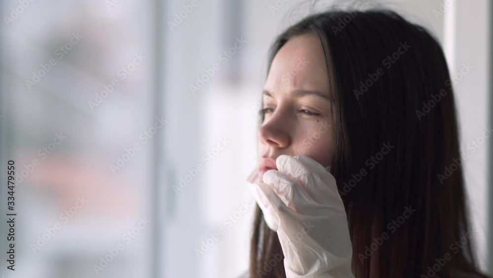 COVID-19 Pandemic Coronavirus infected female teen in home isolation auto quarantine wearing face mask protective for spreading of disease virus SARS-CoV-2 COVID-19 Pandemic Coronavirus infected female teen in home isolation auto quarantine wearing face mask protective for spreading of disease virus SARS-CoV-2