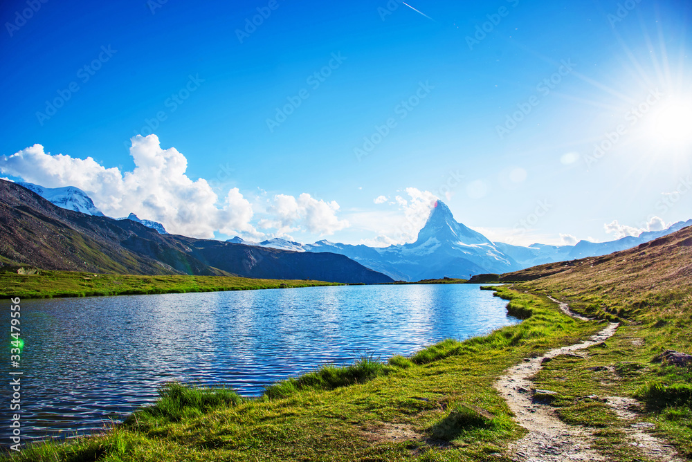 Beautiful magical fairytale landscape with the Matterhorn in the Swiss Alps and Lake Stellisee, near Zermatt, Switzerland. (antistress, harmony, meditation - concept)