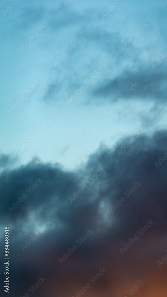 Fantastic clouds at sunrise, vertical panorama Fantastic clouds at sunrise, vertical panorama