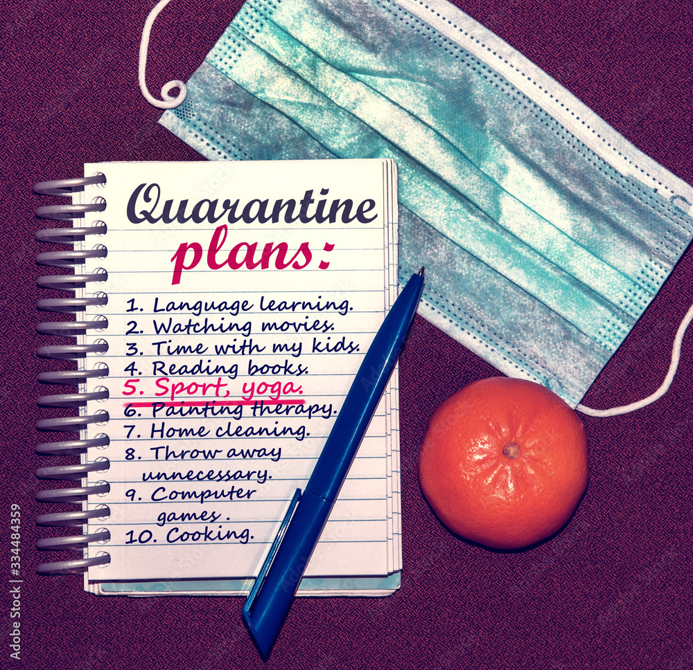 An abstract image of a notebook with plans for what to do while a coronavirus quarantin. Emphasis on movement, sports as the best way to spend your free time.