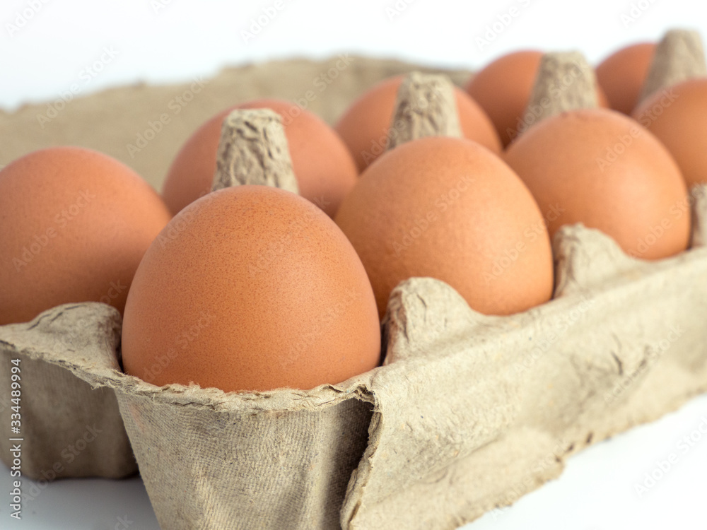 Close up image of fresh chicken eggs in opened box Close up image of fresh chicken eggs in opened box