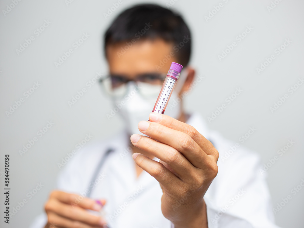 Doctor scientist show coronavirus (COVID-19) vaccine shot for virus infected patient's laboratory Doctor scientist show coronavirus (COVID-19) vaccine shot for virus infected patient's laboratory