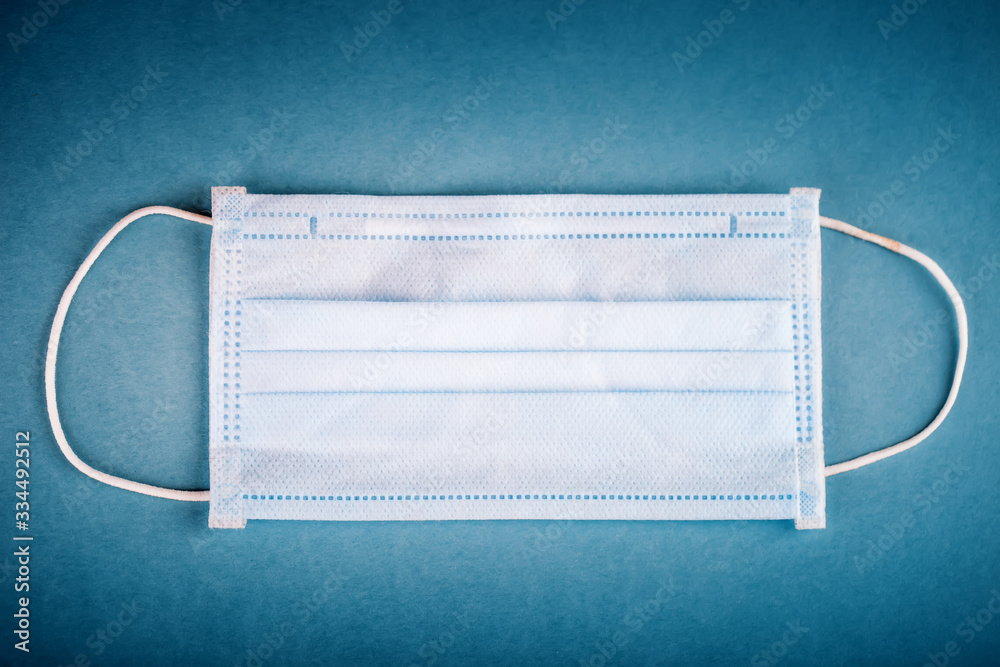 Medical mask on table. Coronavirus Pandemic. Coronaviruses influenza, dangerous flu. Coronavirus 2019-nCoV. Corona virus outbreaking. Covid19. Medical mask on table. Coronavirus Pandemic. Coronaviruses influenza, dangerous flu. Coronavirus 2019-nCoV. Corona virus outbreaking. Covid19.