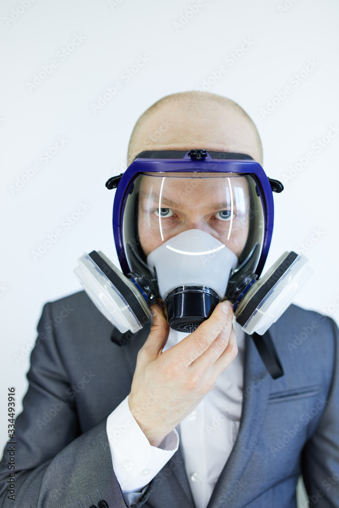 image of business man wearing protective mask against virus and pollution image of business man wearing protective mask against virus and pollution