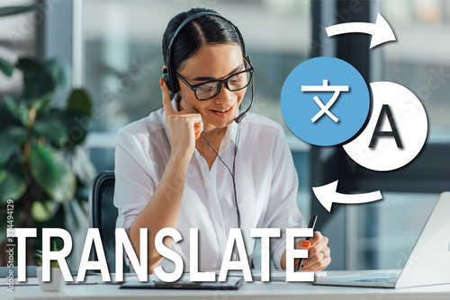 smiling asian translator working online with headset and laptop in office, translate illustration
