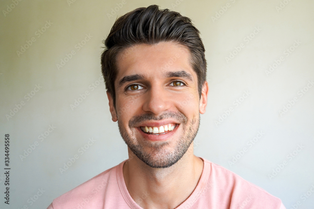 Portrait of a young attractive boy with a wide beautiful smile Portrait of a young attractive boy with a wide beautiful smile
