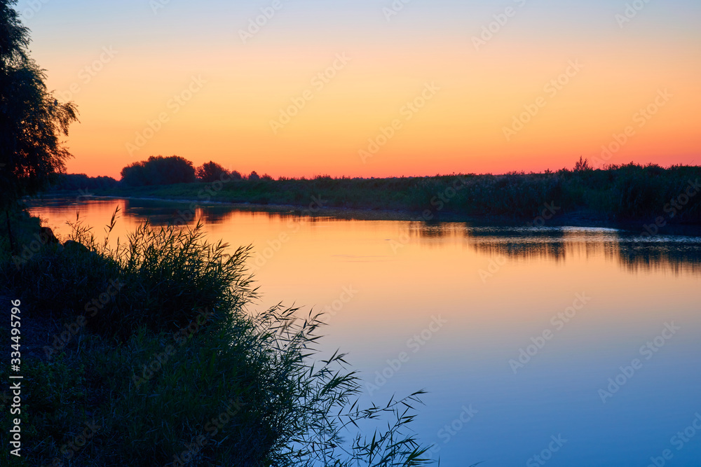 Nature Landscape of Atyrau region. Ural river at sunrise. Kazakhstan. Asia.
