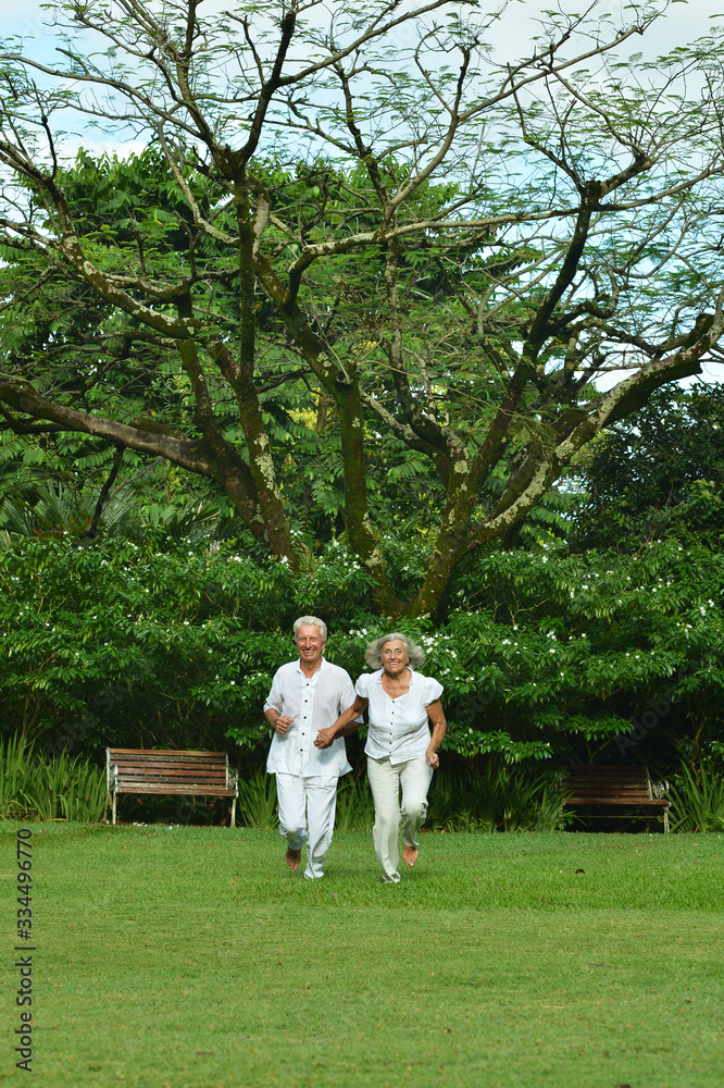 Happy senior woman and man in park Happy senior woman and man in park