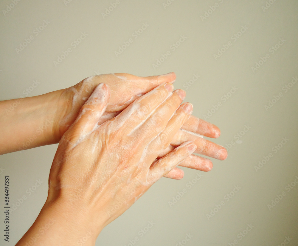 Fototapeta premium washing hands with soap