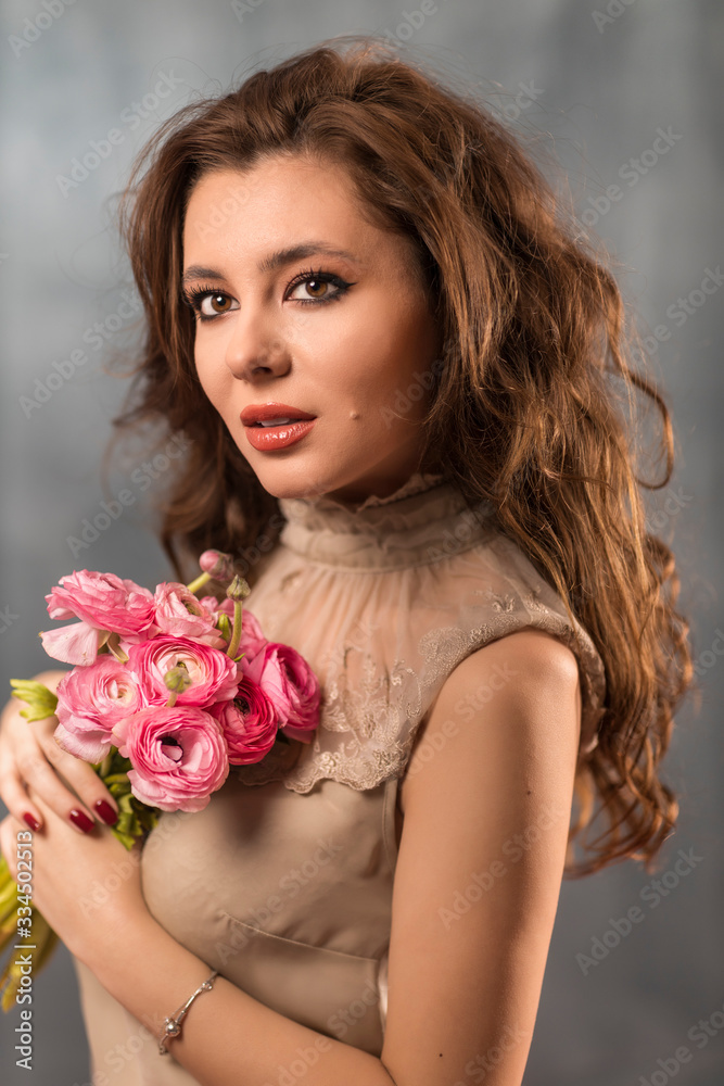 Portrait of young woman with beautiful professional makeup and f Portrait of young woman with beautiful professional makeup and f