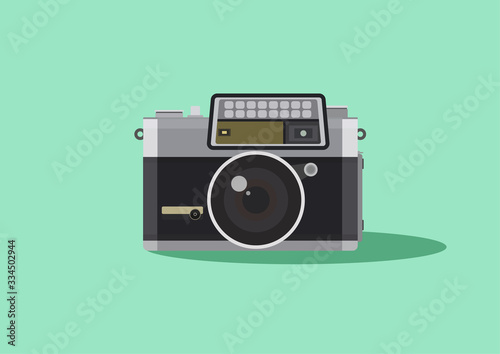 Retro camera in a flat style on a colored background. Old camera design. Vintage film camera. Vector illustration. Analogue 35mm camera