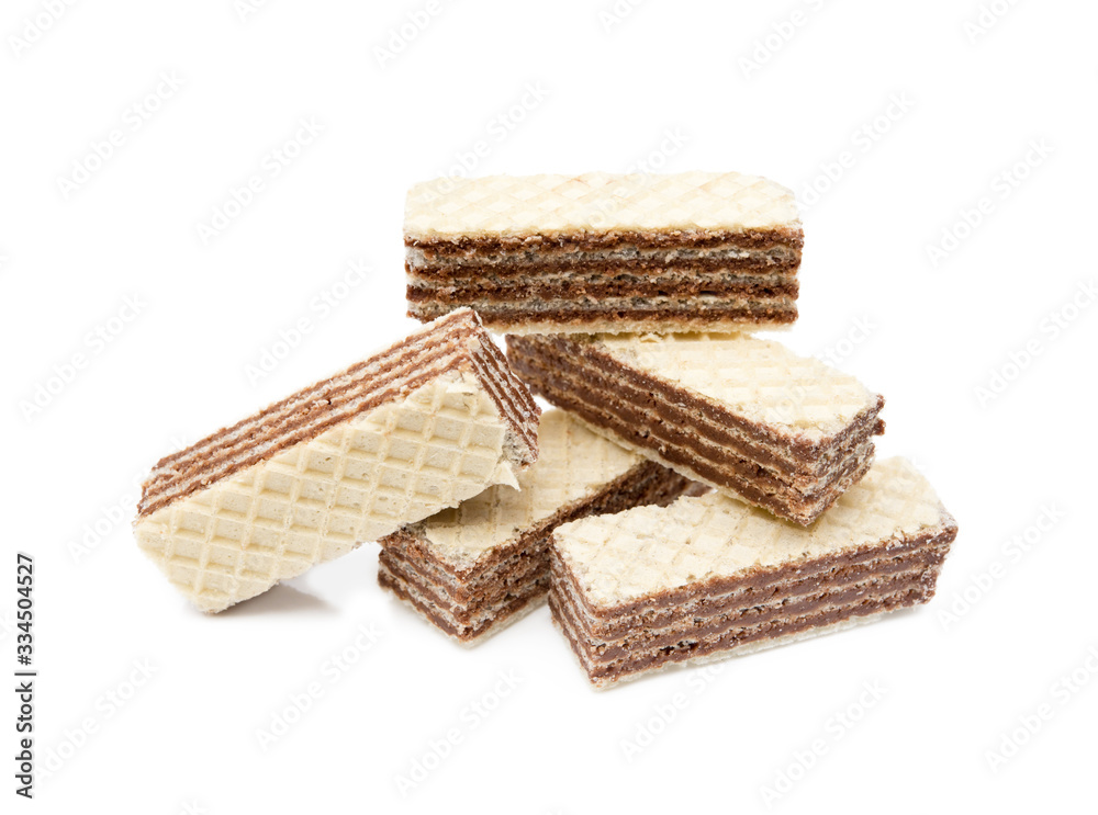 Crispy wafers with creamy hazelnut filling isolated on white background Crispy wafers with creamy hazelnut filling isolated on white background