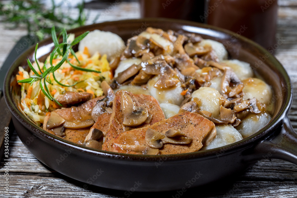 Stewed pork chop in a bright mushroom sauce. Stewed pork chop in a bright mushroom sauce.