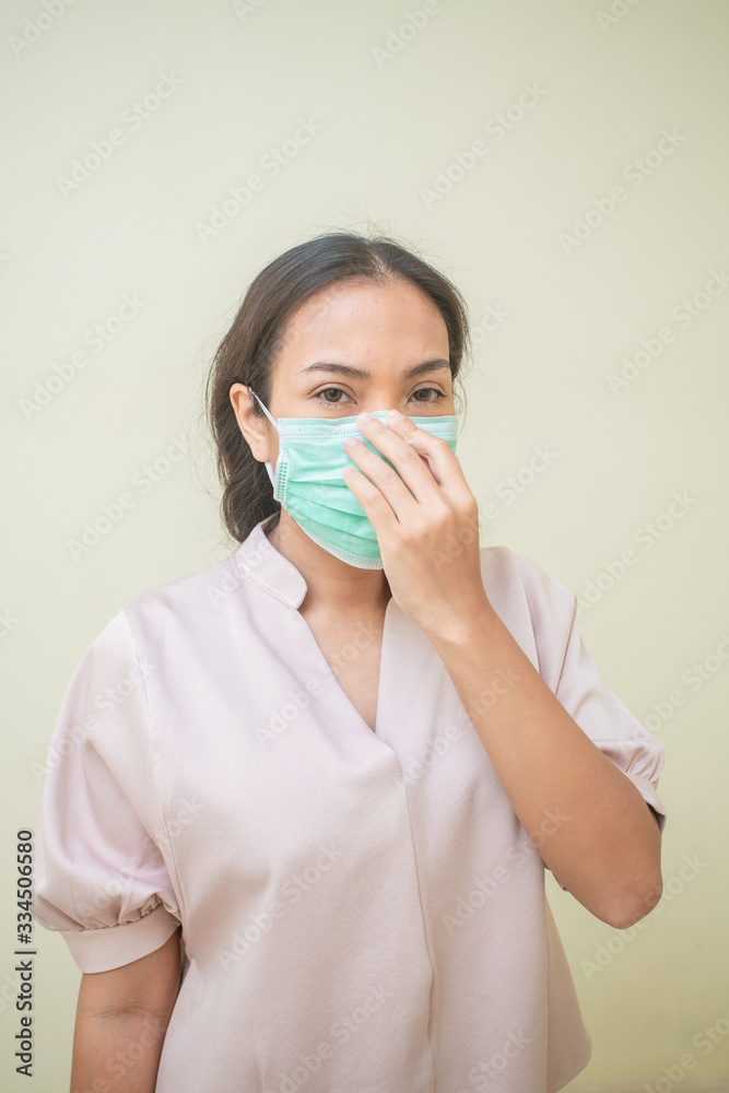Women concerned about the Covid-19 virus And her mask