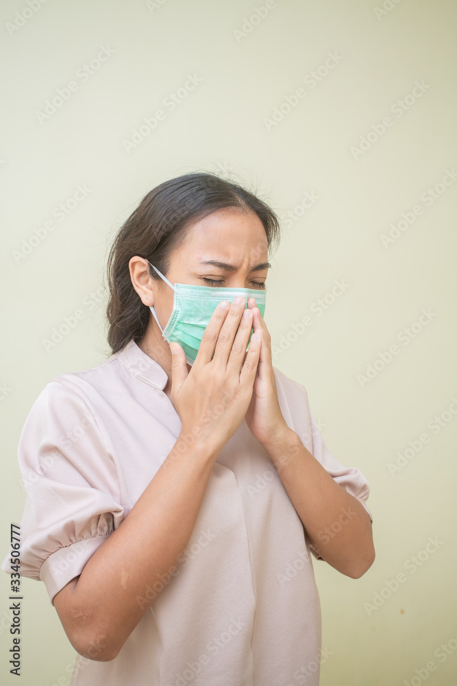 Women concerned about the Covid-19 virus And her mask Women concerned about the Covid-19 virus And her mask