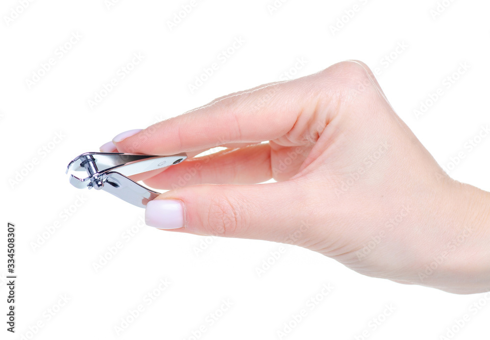Nail scissors in hand on white background isolation Nail scissors in hand on white background isolation