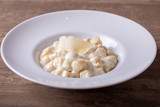 details of fresh hot gnocchi with 4 cheese cream