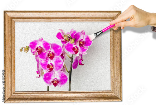 Malowanie obrazu farbą olejną. Ręka malująca obraz z kwiatami orchidei.